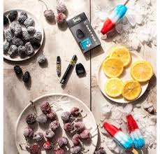INSA Concentrates - Vapes and Dart Pods next to fruit